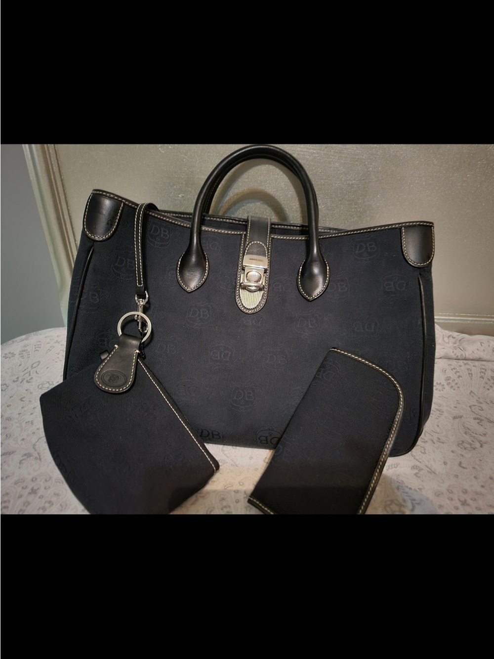 Dooney & Bourke Canavas Black Tote with Matching Wristlet and Wallet
